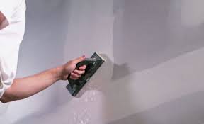 Cómo enyesar y nivelar una pared